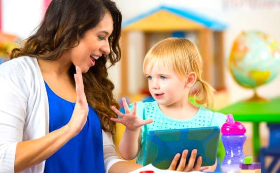Picture of adult holding up 5 fingers with a child