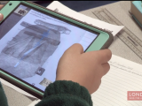 Child using Ipad for Ancient Egypt lesson