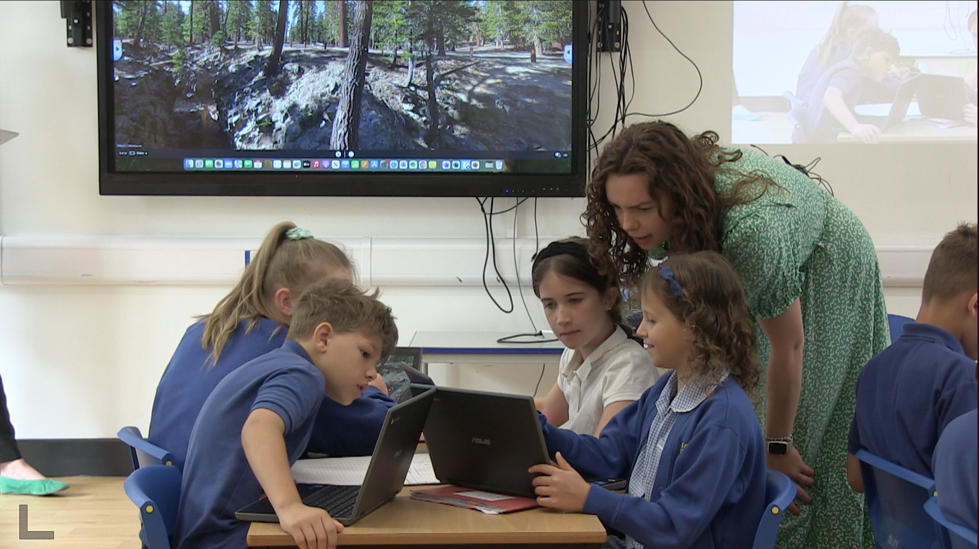 Teacher speaking to students
