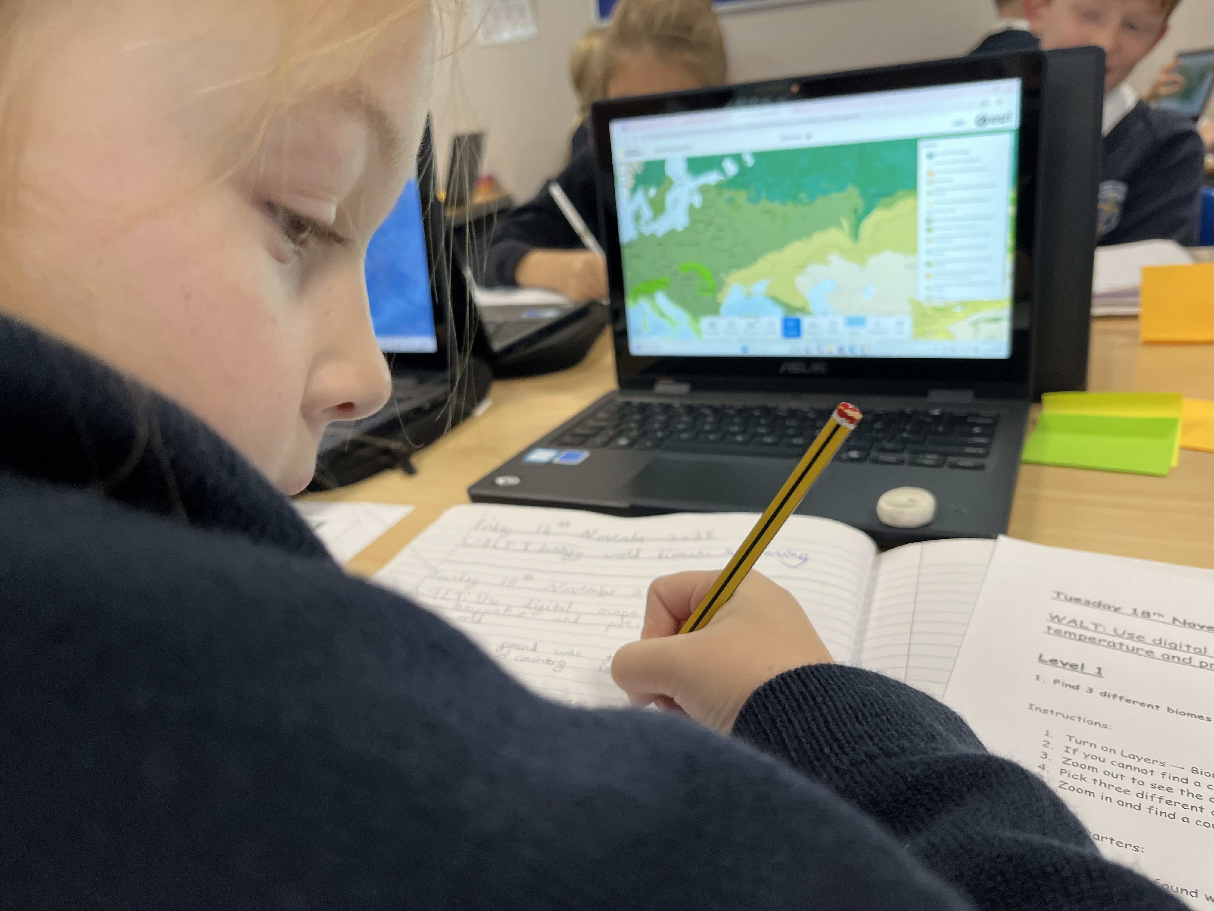 Girl working using laptop to support studies